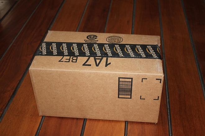 Amazon, utile dimezzato rispetto al lockdown